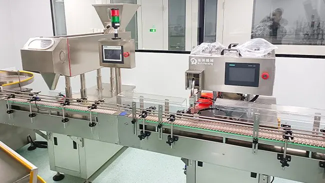 Checkweigher installed after a tablet counting line for bottle weight inspection