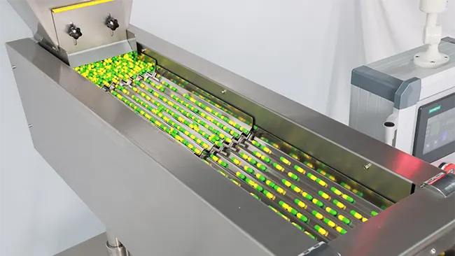 振動チャンネルで混合カプセルを分離する錠剤カプセル計数機