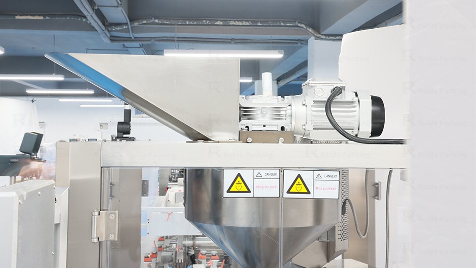 Auger feeding driven by motor