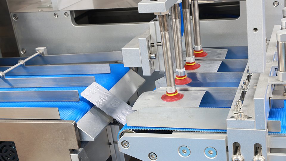 Blister packing machine is doing the rejection