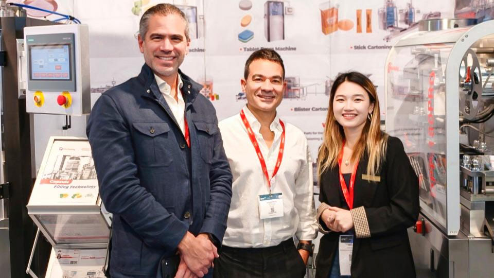 Sales Manager Sara with two Italian clients at CPHI Milan 2026
